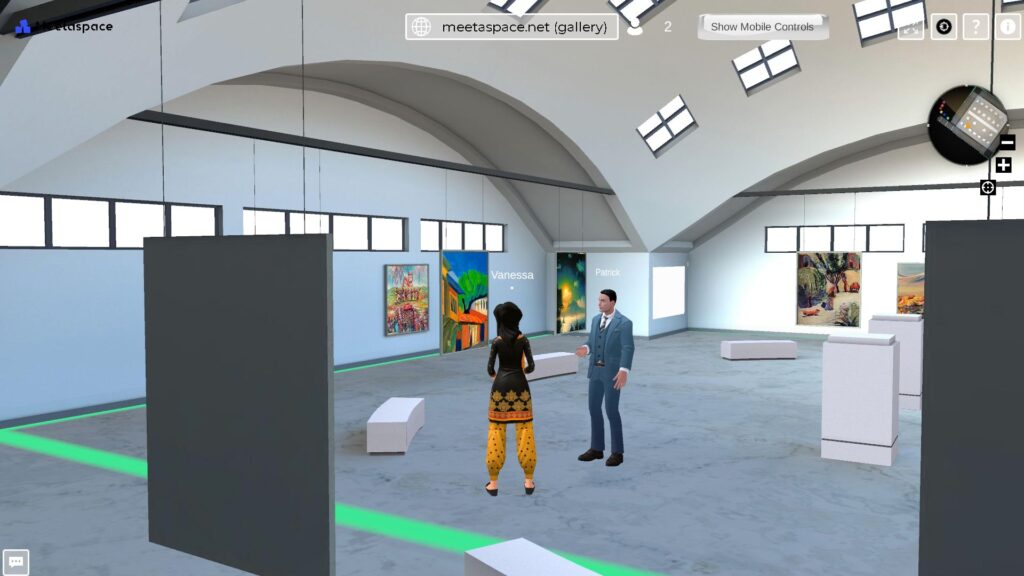Screenshot of a virtual gallery space in the metaverse of the Metaverse Service Provider "Meetaspace" with two avatars talking about the pictures